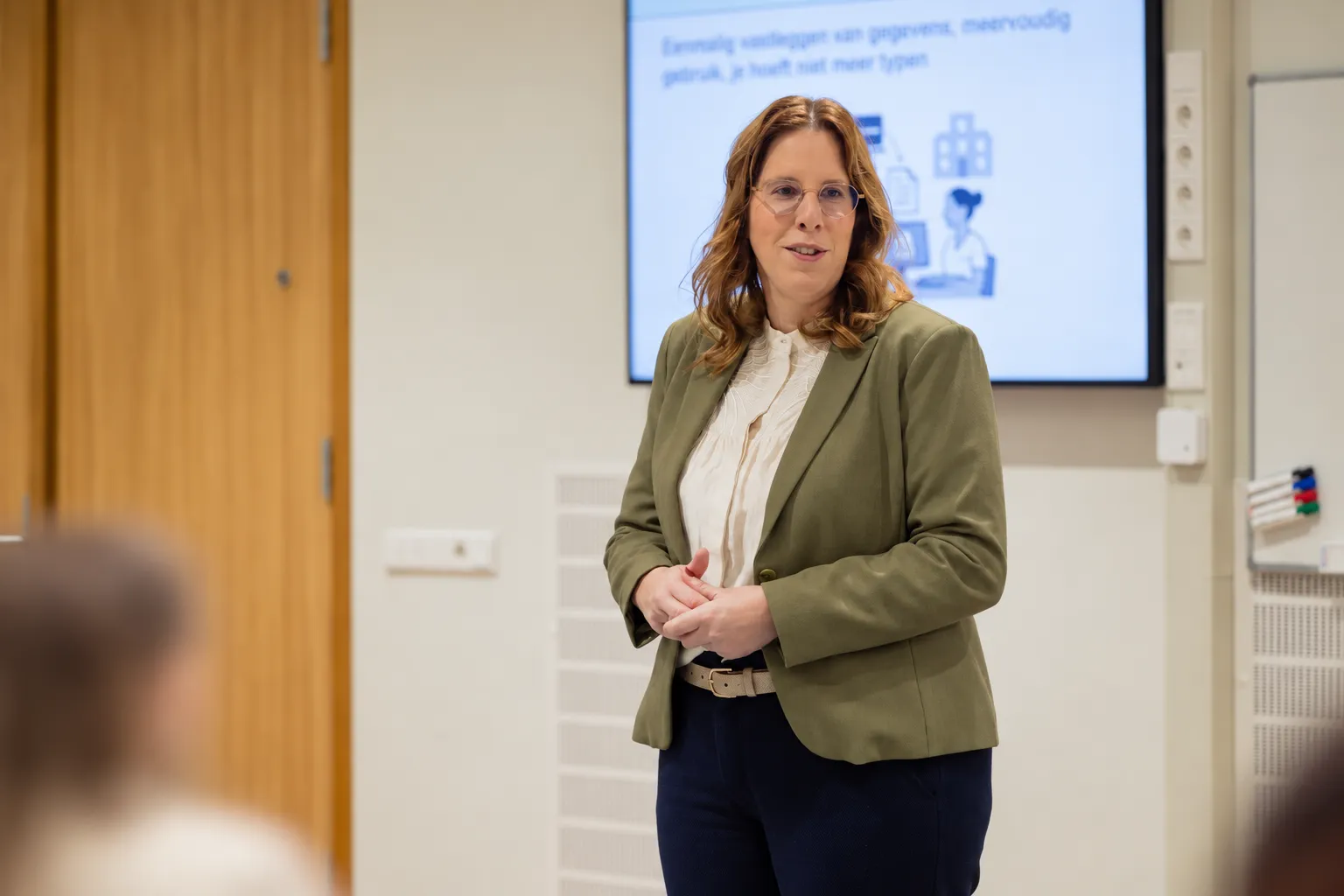 Judith Pleysier, projectmanagement expert, aan het woord tijdens een sessie